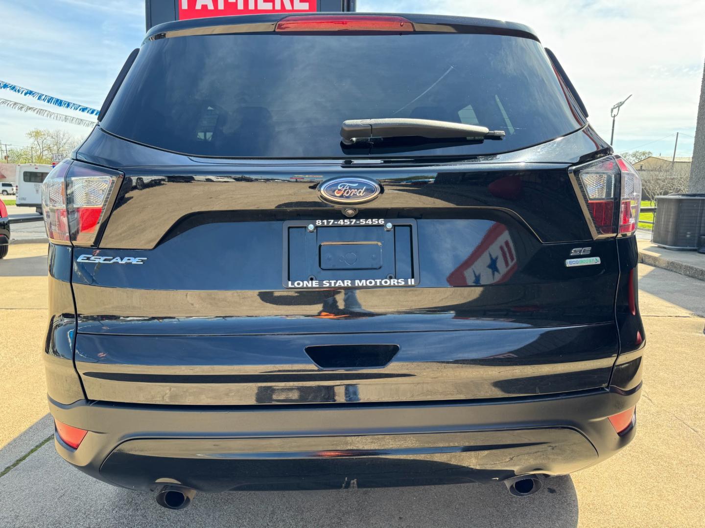 2018 BLACK FORD ESCAPE SE (1FMCU0GD4JU) , located at 5900 E. Lancaster Ave., Fort Worth, TX, 76112, (817) 457-5456, 0.000000, 0.000000 - Photo#4